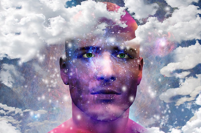 Mans head with stars and clouds