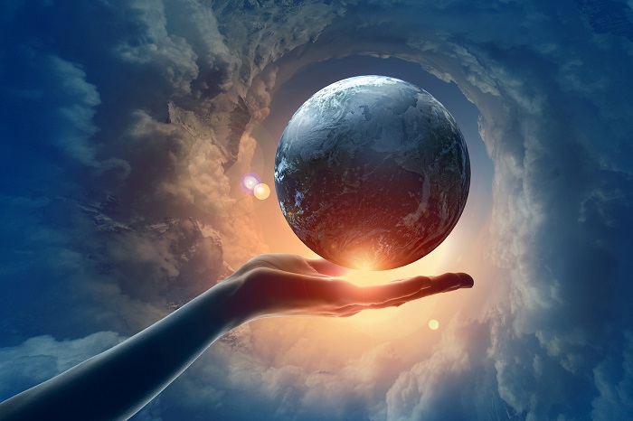 Image of earth planet on hand